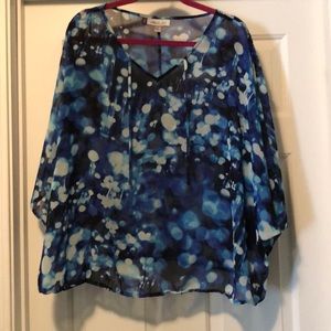 Jennifer Lopez flutter sleeve blouse